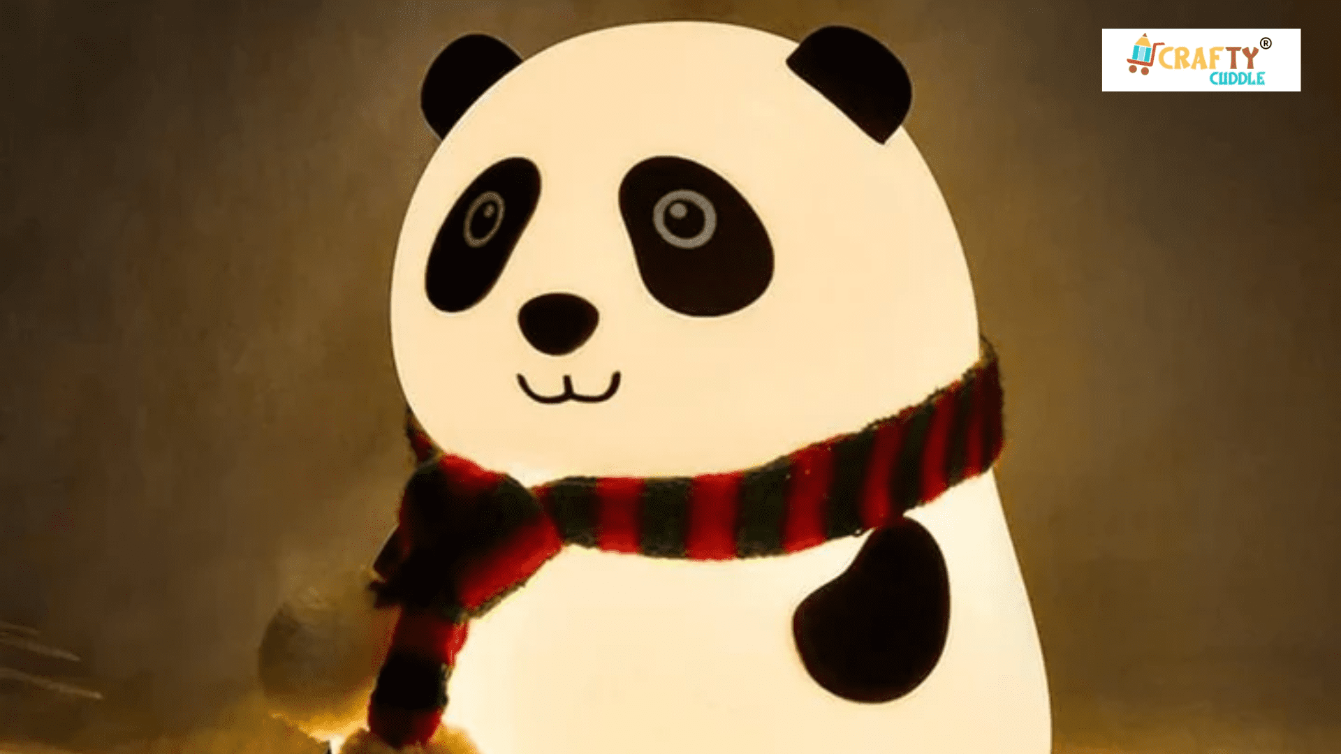 Image of glowing panda lamp in the dark room.