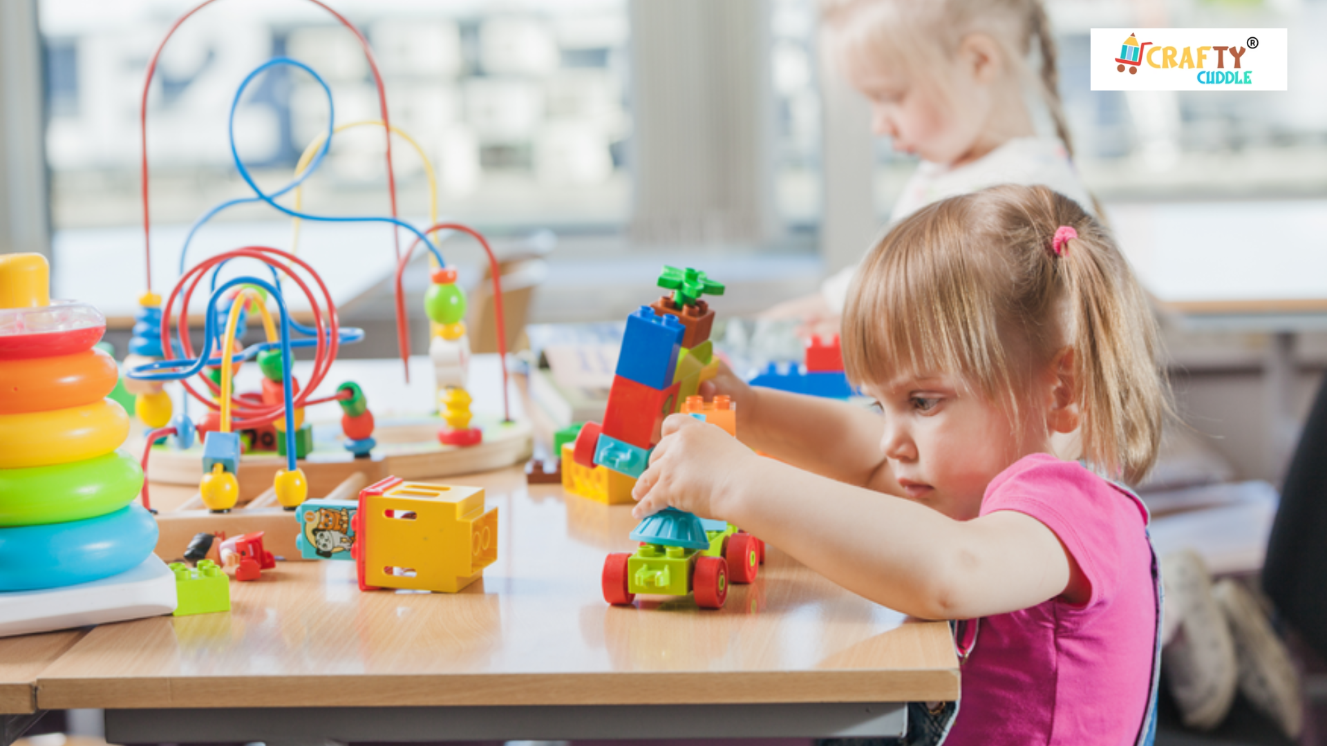 Image of two girls performing the puzzles in the room.