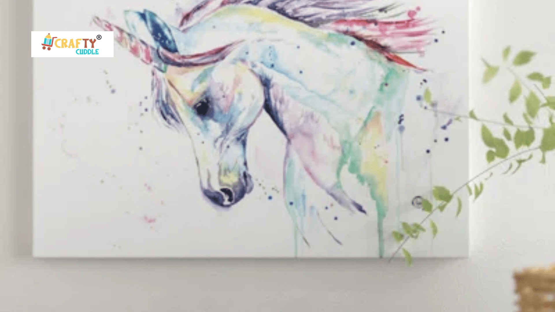 Image of unicorn painting on the white colored wall of the room.