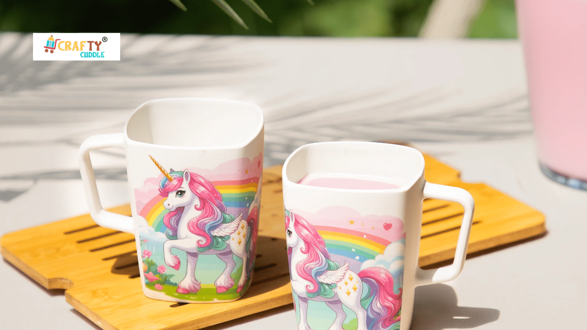 This image includes the mugs of unicorn themed placed in the tray on the table.