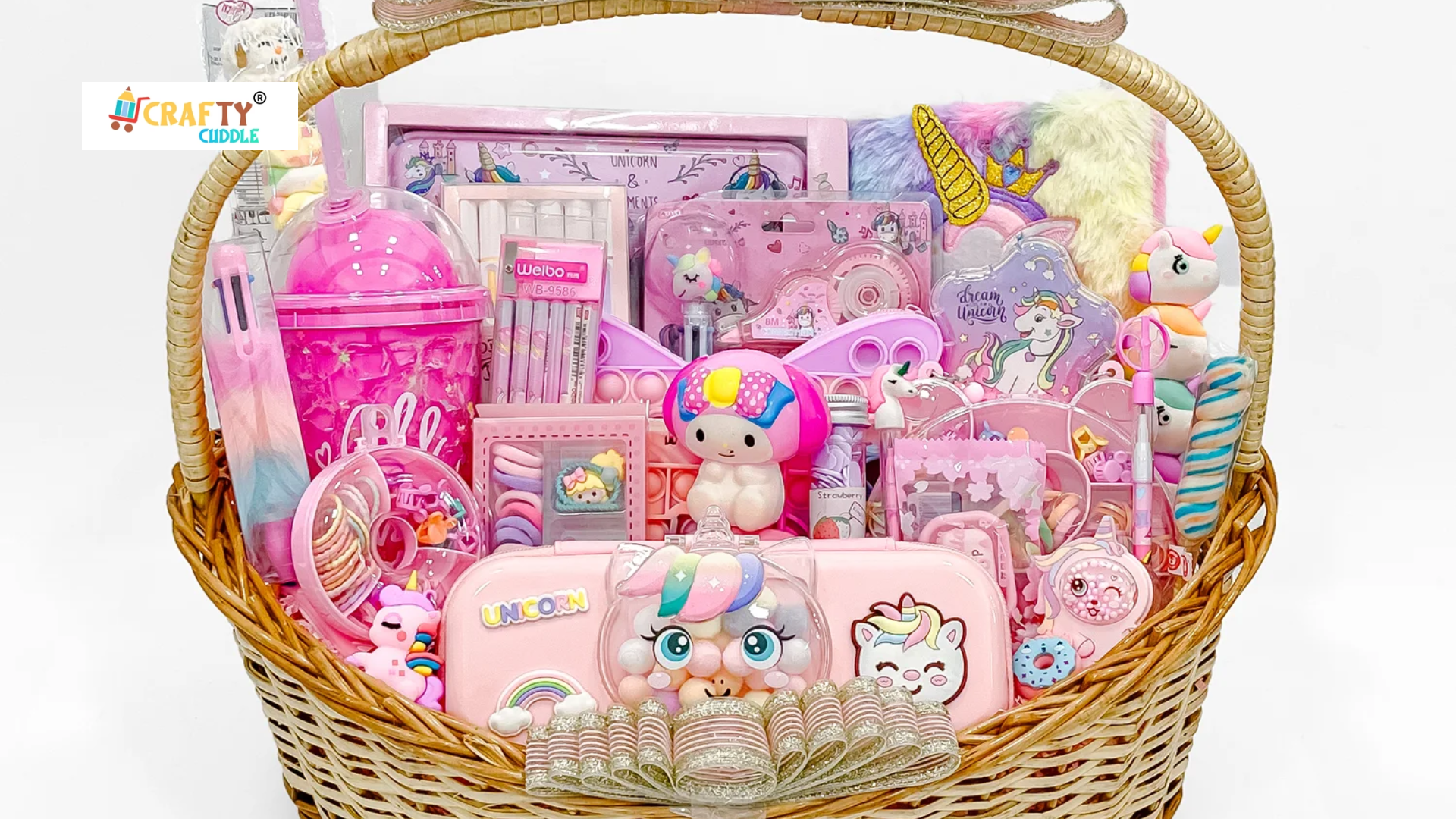 This image consists of the unicorn basket filled with unicorn themed products.