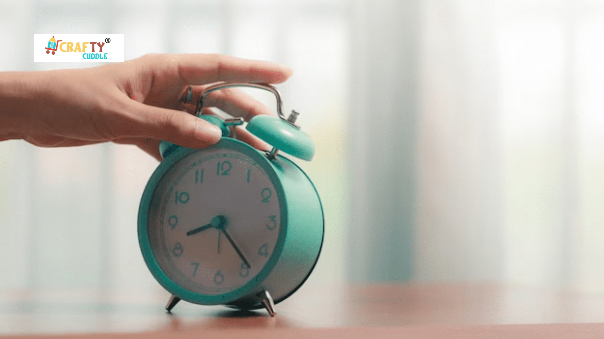 Image of a person setting an alarm clock.