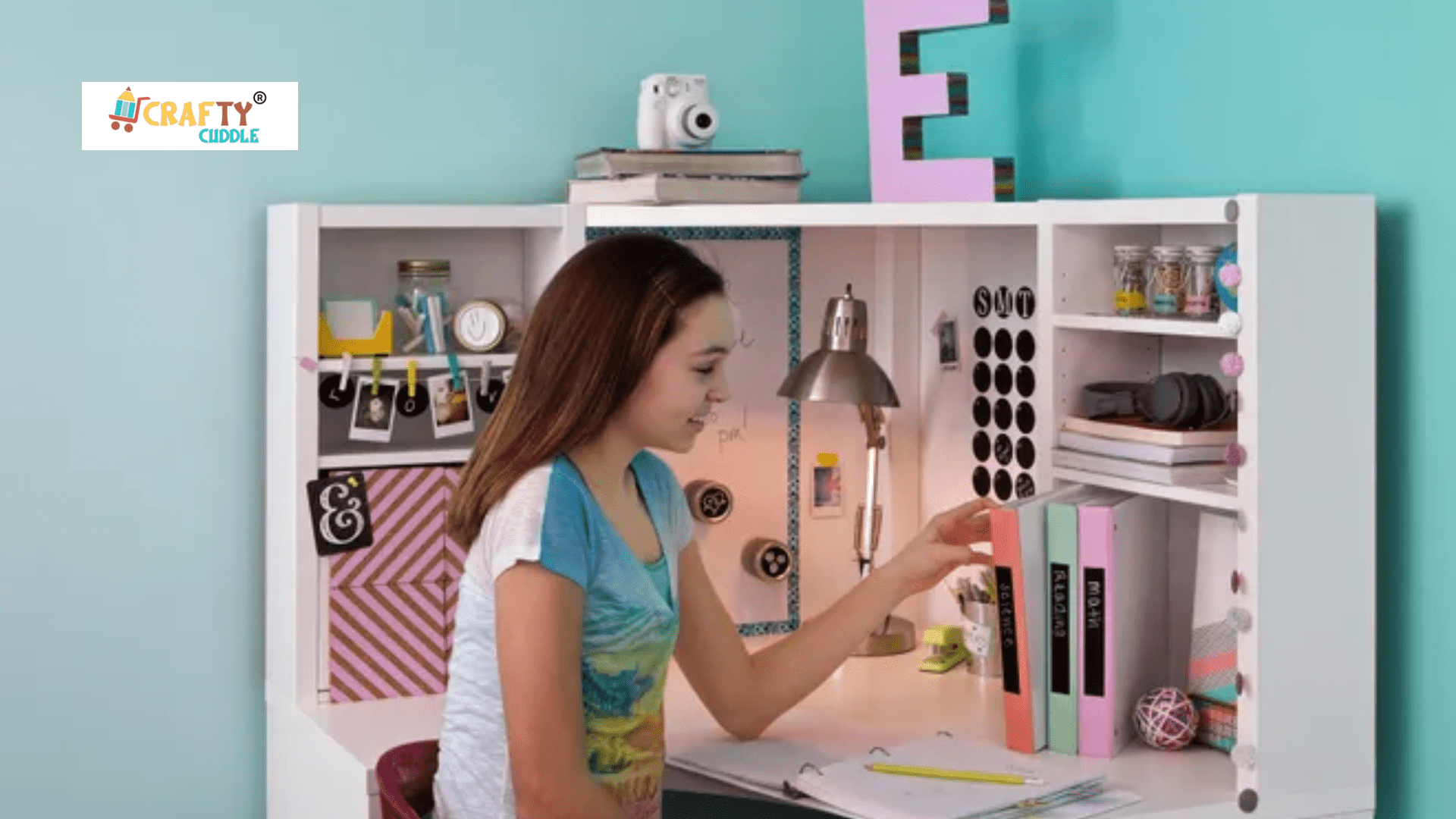 A girl organizing her study desk.