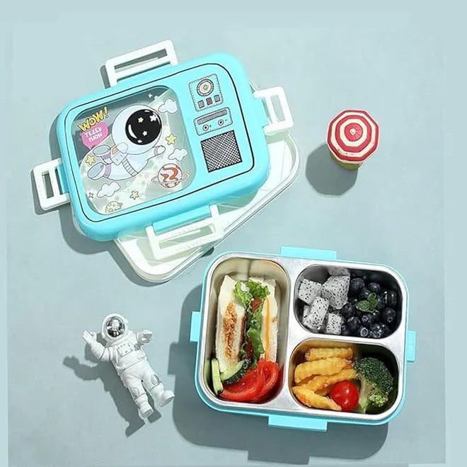an image of blue and white colored space themed lunch box with open containers and filled fruits, vegetables and sandwich in it.