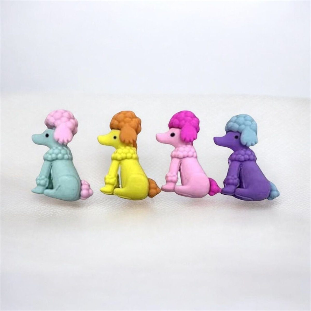 dog-eraserseraserscrafty-cuddle-2146309 Dog ErasersErasersCRAFTY CUDDLEFour colorful poodle figurines erasers in different colors on a white background1animalerasersbacktoschoolsupplies