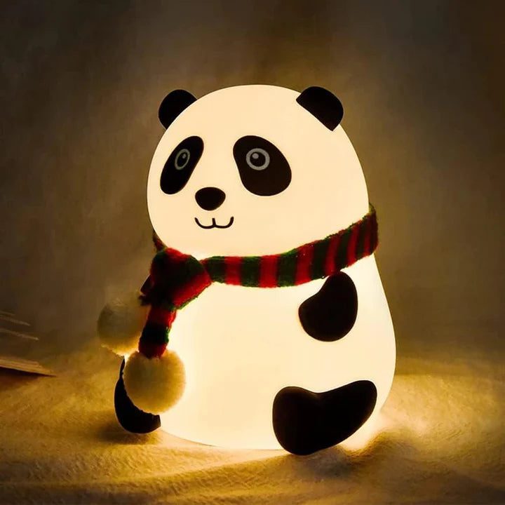 image of panda lamp glowing in the dark room.