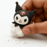 Kuromi 2 - in - 1 Sharpener and EraserStationery > Erasers & SharpenersCRAFTY CUDDLESmall black, white, and pink eraser held by a hand on a light background2in1SharpenerEraserAnimeStationery