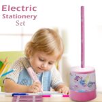 Child using an electric stationery set with a pink pencil and holder featuring a unicorn design.