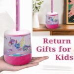 Pink sharpener with unicorn design held in a hand, with another Sharpener on a surface in the background.