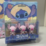 Packaged toy erasers of a character resembling Stitch with a blue background