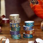 Washi Tape 20 Rolls – Dun Huang Art SeriesCRAFTY CUDDLEColorful washi tapes on a wooden surface with a blurred background