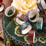 Washi Tape 20 Rolls – Oil Painting GreenCRAFTY CUDDLEDecorative washi tape with intricate designs on a decorative plate with flower design.