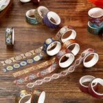 Washi Tape 20 Rolls – Dun Huang Art SeriesCRAFTY CUDDLEDecorative tape rolls with intricate patterns on a wooden surface