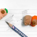 Capybara ErasersErasersCRAFTY CUDDLETwo small animal figurines erasers near a pencil on a white wooden surface1AnimalLoversCapybaraArt