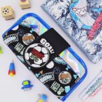 Kids' football-themed pencil pouch featuring sporty design with soccer ball graphics.