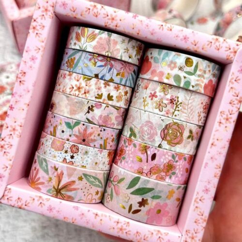 Set of floral-patterned washi tape rolls in a decorative box