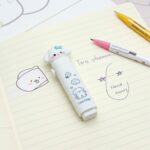Cute Push - Pull Cartoon Erasers for KidsCRAFTY CUDDLEDog theme push pull eraser on a notebook page with drawingsDog