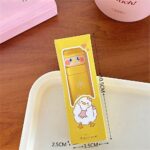 Cute Push - Pull Cartoon Erasers for KidsCRAFTY CUDDLEYellow cartoon duck eraser with packaging on a wooden surfaceDuck