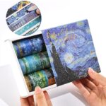 Washi Tape - 18 Rolls Vincent Van Gogh SeriesDecorative Washi TapeCRAFTY CUDDLESet of washi tape rolls with 'Starry Night' design packaging held by a hand.WashiTape WashiTapeAddict StationeryAddict CuteStationery PlannerAddict BulletJournal Scrapbooking DIYCrafts PaperCrafts CreativeJournaling StationeryShop