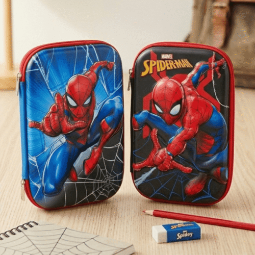 Two Spider-Man pencil cases on a wooden surface with a notebook and eraser.
