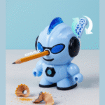 Robot Shape Manual Pencil SharpenerStationery > Erasers & SharpenersCRAFTY CUDDLEBlue robot - shaped pencil sharpener with a pencil and shavings on a light blue backgroundBlueKidsStationery CuteStationery KawaiiStationery SchoolSupplies StationeryAddict CartoonStationery BackToSchool StudyEssentials PastelStationery StationeryLove