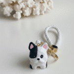 Cute 3D Cartoon Dog KeychainKeychainsCRAFTY CUDDLEKeychain shaped like a dog with a white backgroundWhiteDogKeychain CuteAccessories KawaiiStyle BagCharm KeyringLove PuppyLovers CuteStationery GiftIdeas TrendingNow AccessoriesForHer