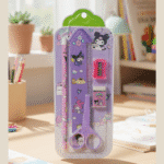 Children's scissors and ruler set with cartoon characters in packaging on a desk.