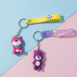 Cute Teddy Bear Silicone KeychainKeychainsCRAFTY CUDDLETwo keychains on a colorful background with 'Trabzon' and 'Wishing Star' text.1TeddyBearKeychain CuteKeychain CartoonKeyring KawaiiAccessories GirlsBagCharm BackpackCharm SiliconeKeychain ReturnGifts TrendyKeychains GiftForGirls