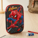 Superhero Spiderman Pencil PouchPencil PouchCRAFTY CUDDLESpider - Man pencil case with a pencil and eraser on a wooden surfaceRedSpidermanPencilBox SuperheroStationery BoysSchoolSupplies SpidermanMerch EVAHardCase SchoolPencilCase CartoonPencilBox BackToSchool KidsStationery MarvelFans SuperheroTheme SchoolEssentials