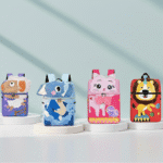 Four colorful animal-themed backpacks on a light gray background