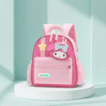 Cute Cartoon Backpack with Mini PouchKids BagsCRAFTY CUDDLEPink children's backpack with cartoon character design on a light green backgroundDark Pink