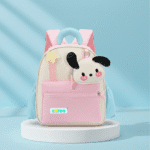 Cute Cartoon Backpack with Mini PouchKids BagsCRAFTY CUDDLEPink and white backpack with a cartoon dog face on a blue backgroundSoft Pink