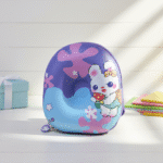Children's purse with unicorn design on a wooden surface