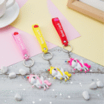 Colorful keychains with cartoon characters on a colorful background