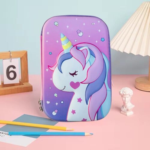 Purple pencil case with a unicorn design on a pink surface with stationery items.