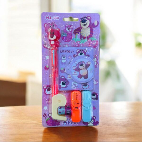Packaged children's stationery set with cartoon characters on a blurred background