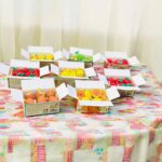 Cute Fruit Shape Eraser Set in Storage BoxErasersCRAFTY CUDDLEColorful erasers fruits and vegetables in boxes on a patterned tablecloth.1 BoxFruitErasers CuteStationery KidsStationery KawaiiStationery ReturnGiftIdeas SchoolSupplies StationeryAddict NoveltyErasers BackToSchool StationeryLovers