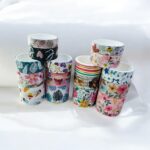 Star Pattern Washi Tape – 50 RollsDecorative Washi TapeCRAFTY CUDDLESet of colorful washi tape rolls stacked on a white surfacewashitape washitapelove washitapecollection papercrafts diycrafts journaling bulletjournal plannerdecor creativejournaling stationerylovers aestheticstationery