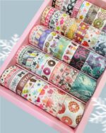 Cute Dessert & Heart Theme Washi Tape Box – 50 RollsDecorative Washi TapeCRAFTY CUDDLEAssorted colorful washi tape rolls in a pink box on a light blue backgroundwashitape washitapelove washitapecollection papercrafts diycrafts journaling bulletjournal plannerdecor creativejournaling stationerylovers aestheticstationery