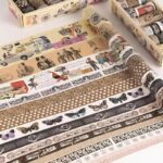 Vintage Washi Tape Set – 18 RollsDecorative Washi TapeCRAFTY CUDDLECollection of decorative washi tape rolls with various patterns on a white background6D Return Box