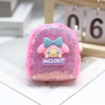 Mini Sequin Coin Pouch for KidsCoin pouchCRAFTY CUDDLEPink pouch with sequins and a character design on a light surface.Dark PinkSequinPouch CuteAccessories KidsAccessories CoinPouch GlitterPouch ReturnGiftIdeas KawaiiStyle MiniPouch StationeryLovers TrendyKids