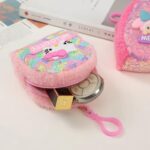 Mini Sequin Coin Pouch for KidsCoin pouchCRAFTY CUDDLEPink sequin pouch with a cartoon character on a white surfaceDark PinkSequinPouch CuteAccessories KidsAccessories CoinPouch GlitterPouch ReturnGiftIdeas KawaiiStyle MiniPouch StationeryLovers TrendyKids