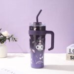 Sanrio Stainless Steel Insulated TumblerTumblersCRAFTY CUDDLEPurple tumbler with cartoon character design on a white surface with a purple backgroundPurpleStainlessSteelTumbler InsulatedCup CuteDrinkware KawaiiStyle CartoonTumbler TravelMug HotAndCold ReusableCup AestheticVibes GiftIdeas