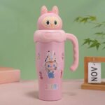 Kids Cartoon Stainless Steel Insulated Sipper BottleTumblersCRAFTY CUDDLEPink cartoon - style water bottle with a handle on a pink surface against a green backgroundLight Pink BunnyKidsWaterBottle CartoonBottle StainlessSteelBottle 1000mlBottle SchoolWaterBottle SipperBottle LeakproofBottle KidsEssentials BackToSchool ReusableBottle