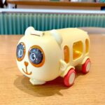 Cute Panda Kids Trolley Water BottleLeakproof Water BottlesCRAFTY CUDDLEBus water bottle with panda design on a wooden surfaceYellowKidsWaterBottle PandaBottle TrolleyBottle CartoonWaterBottle SchoolBottle StrawSipperBottle LeakproofBottle CuteKidsAccessories BackToSchoolEssentials KidsGiftIdeas