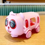 Cute Panda Kids Trolley Water BottleLeakproof Water BottlesCRAFTY CUDDLEBus water bottle with panda design on a wooden surfacePinkKidsWaterBottle PandaBottle TrolleyBottle CartoonWaterBottle SchoolBottle StrawSipperBottle LeakproofBottle CuteKidsAccessories BackToSchoolEssentials KidsGiftIdeas