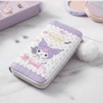 Cartoon Zipper Wallet with Pom PomPencil PouchCrafty CuddleCute purple wallet with cartoon character on a marble surfaceKuromicutewallet kawaiiwallet girlswallet cartoonwallet cuteaccessories kawaiistyle girlsfashionaccessories trendingwallet giftforgirls cutekawaii