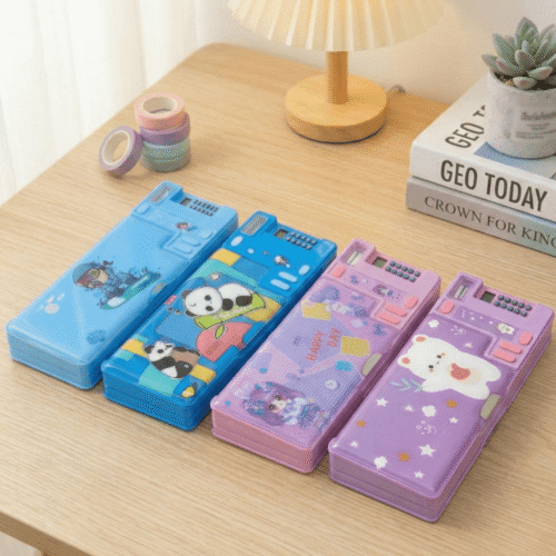 Four colorful pencil cases with cartoon designs on a wooden table.