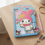 Cute Mini Diary with Sticker BookDiaryCrafty CuddleNotebook with cartoon character on a wooden surfaceMy MelodyMiniDiary CuteStationery KidsNotebook StickerBook KawaiiStationery KidsStationery CartoonNotebook StationeryAddict CuteNotebooks StationeryLovers
