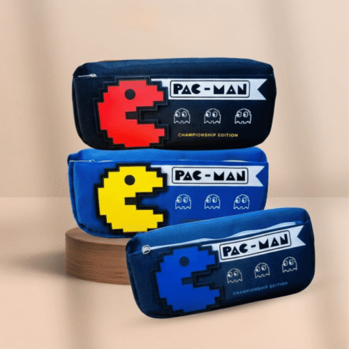 Three Pac-Man pencil cases stacked on a beige background